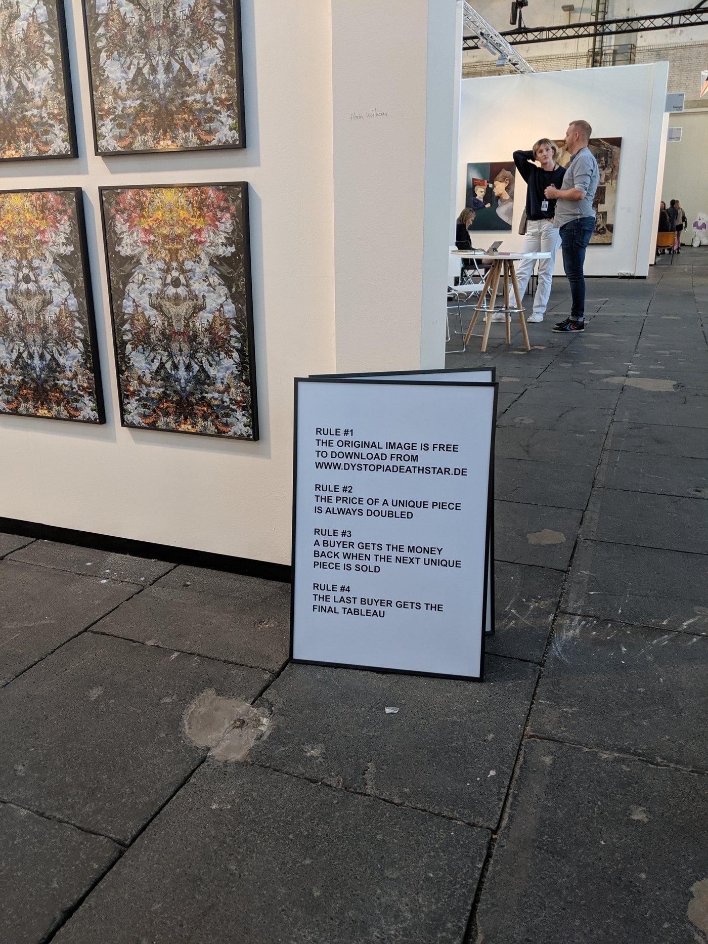 art berlin 2019 — dystopia_deathstar prints and the framed rules on the fair floor