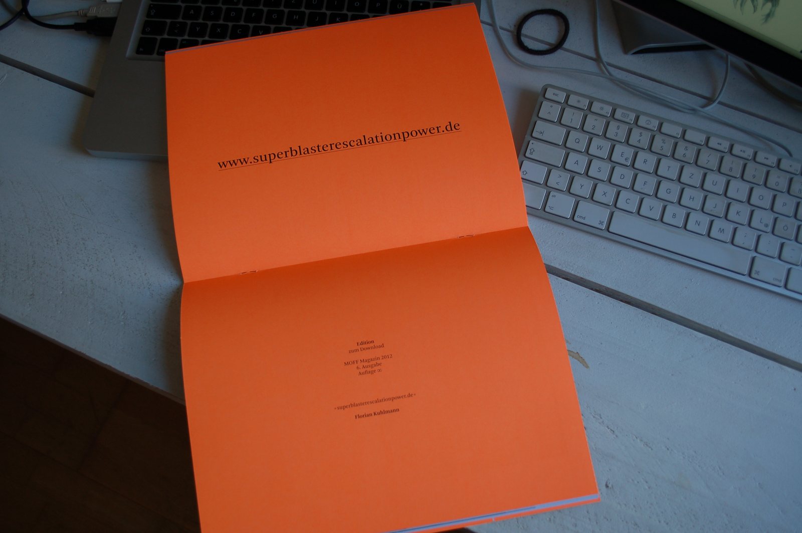 MOFF Magazin 2012, 6th issue — the orange download edition printed with only the URL www.superblasterescalationpower.de and 'Auflage ∞'